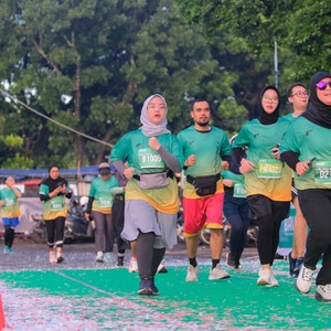 Race photo from BAUR RUN 2025
