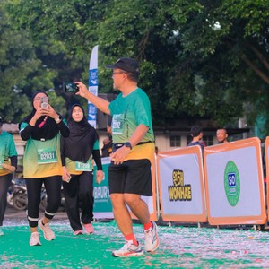 Race photo from BAUR RUN 2025