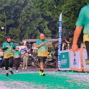 Race photo from BAUR RUN 2025
