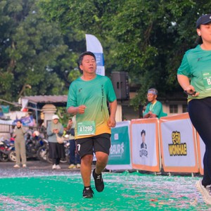 Race photo from BAUR RUN 2025