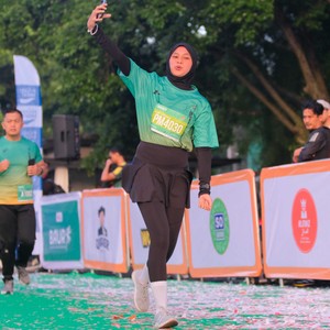 Race photo from BAUR RUN 2025
