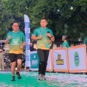 Race photo from BAUR RUN 2025