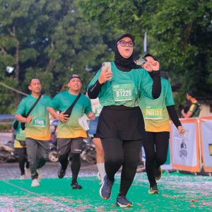 Race photo from BAUR RUN 2025