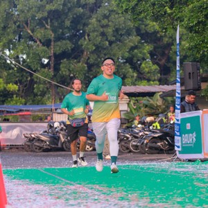 Race photo from BAUR RUN 2025