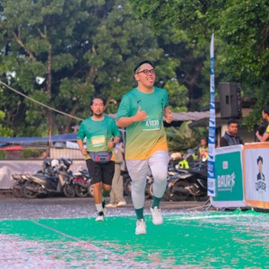 Race photo from BAUR RUN 2025