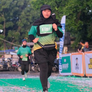 Race photo from BAUR RUN 2025