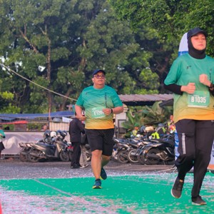 Race photo from BAUR RUN 2025