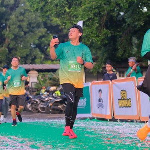 Race photo from BAUR RUN 2025