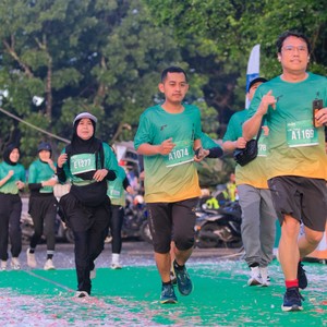 Race photo from BAUR RUN 2025