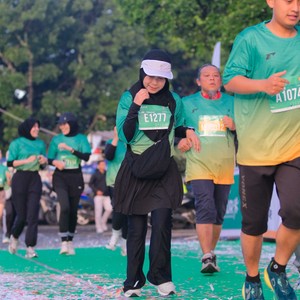 Race photo from BAUR RUN 2025