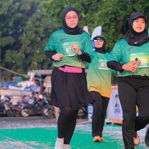 Race photo from BAUR RUN 2025