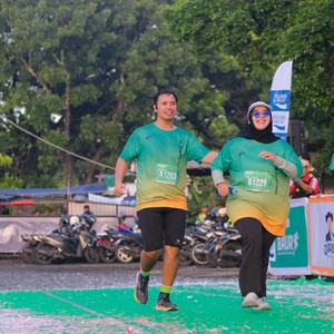 Race photo from BAUR RUN 2025