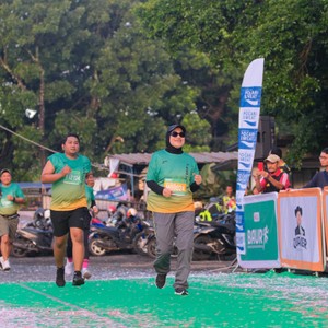 Race photo from BAUR RUN 2025