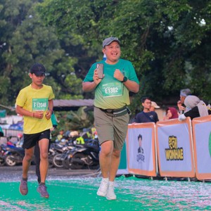 Race photo from BAUR RUN 2025