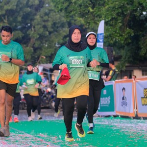 Race photo from BAUR RUN 2025