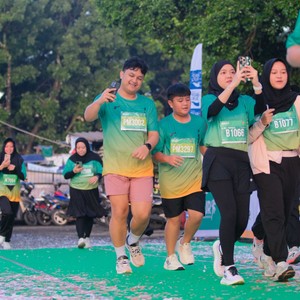 Race photo from BAUR RUN 2025