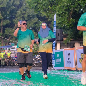 Race photo from BAUR RUN 2025