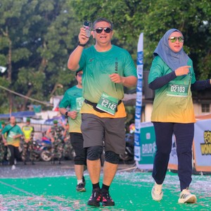 Race photo from BAUR RUN 2025
