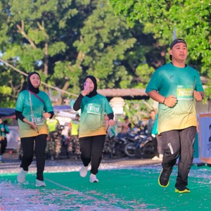 Race photo from BAUR RUN 2025