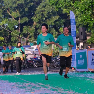 Race photo from BAUR RUN 2025