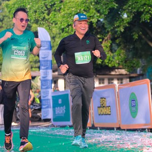Race photo from BAUR RUN 2025