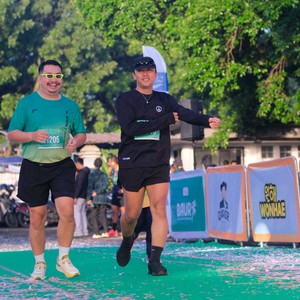 Race photo from BAUR RUN 2025