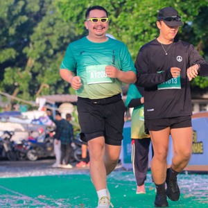 Race photo from BAUR RUN 2025