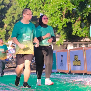 Race photo from BAUR RUN 2025