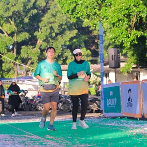 Race photo from BAUR RUN 2025
