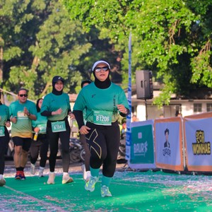 Race photo from BAUR RUN 2025