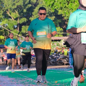 Race photo from BAUR RUN 2025