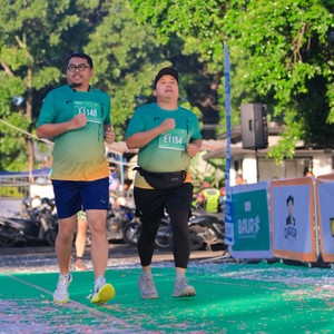 Race photo from BAUR RUN 2025