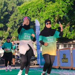 Race photo from BAUR RUN 2025