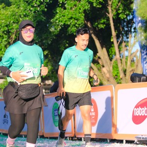 Race photo from BAUR RUN 2025