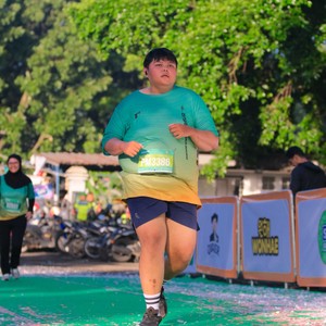 Race photo from BAUR RUN 2025
