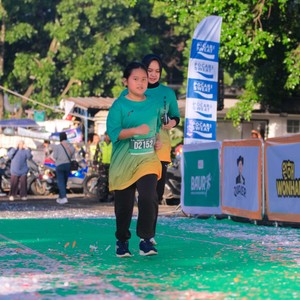 Race photo from BAUR RUN 2025