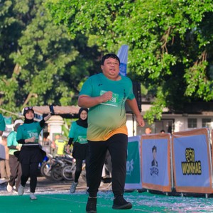 Race photo from BAUR RUN 2025
