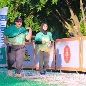 Race photo from BAUR RUN 2025