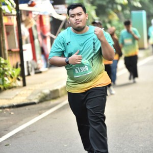 Race photo from BAUR RUN 2025