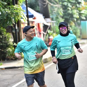 Race photo from BAUR RUN 2025