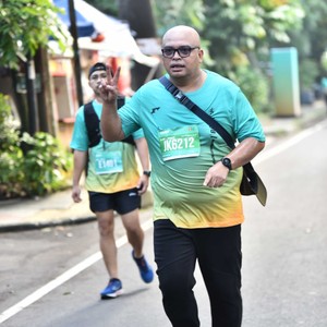 Race photo from BAUR RUN 2025