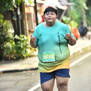 Race photo from BAUR RUN 2025