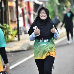 Race photo from BAUR RUN 2025