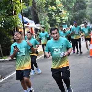 Race photo from BAUR RUN 2025