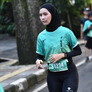 Race photo from BAUR RUN 2025
