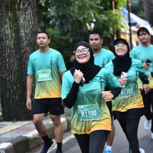Race photo from BAUR RUN 2025
