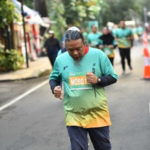 Race photo from BAUR RUN 2025