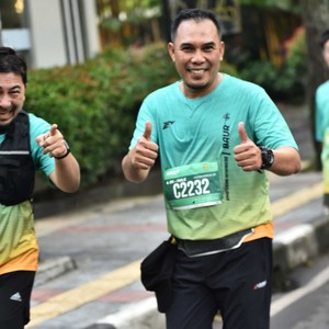 Race photo from BAUR RUN 2025