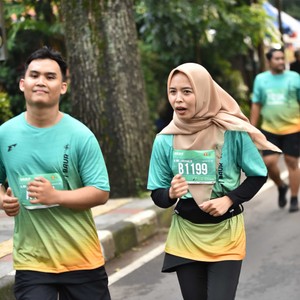 Race photo from BAUR RUN 2025