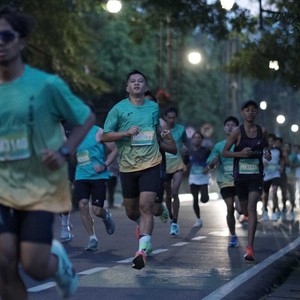Race photo from BAUR RUN 2025